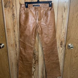 Tan/light brown leather boot cut pants with tan stitching. Size 4. Gap.